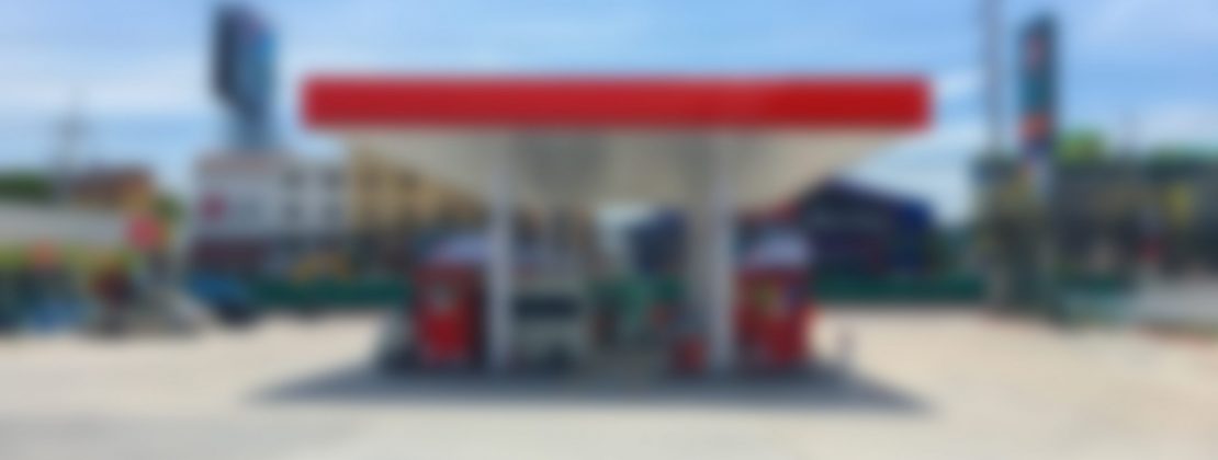 Abstract blur fuel gas station exterior for background